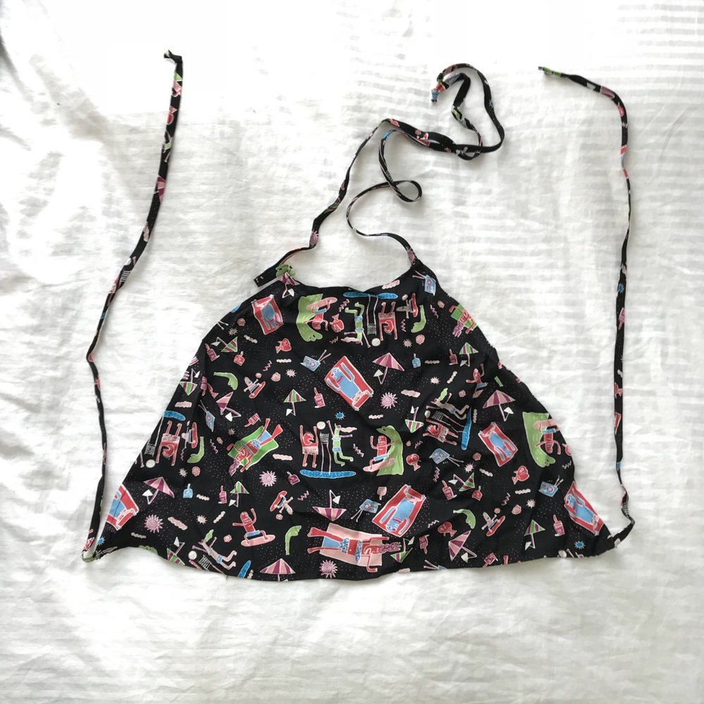 A crop halter/tie top (above belly button crop)